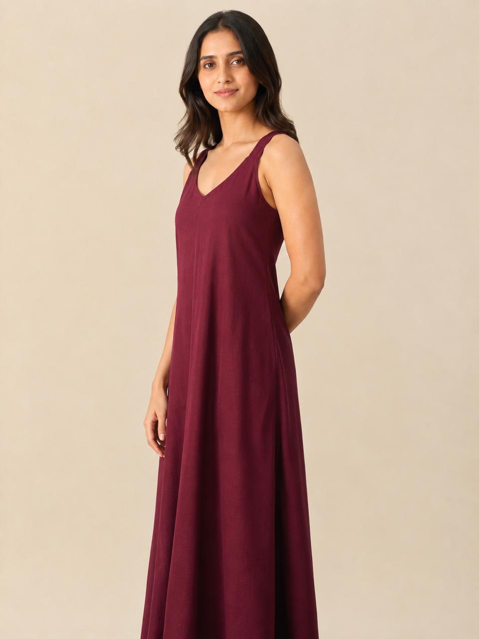 Side profile of the flowing Dhyana women's rayon meditation robe in maroon